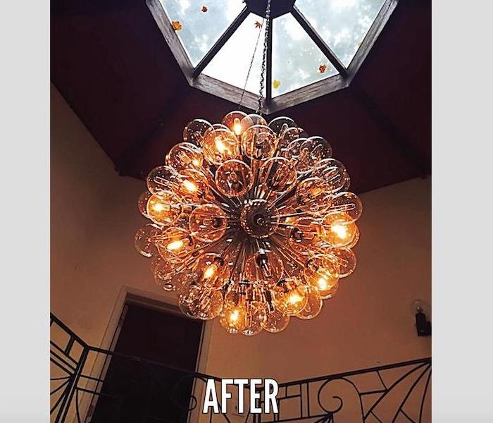 large glass ball chandelier after cleaning