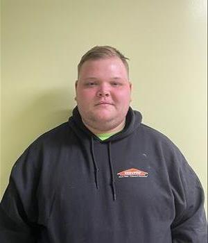 Young man standing with a Servpro sweatshirt on