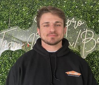 Young man standing with a Servpro sweatshirt on