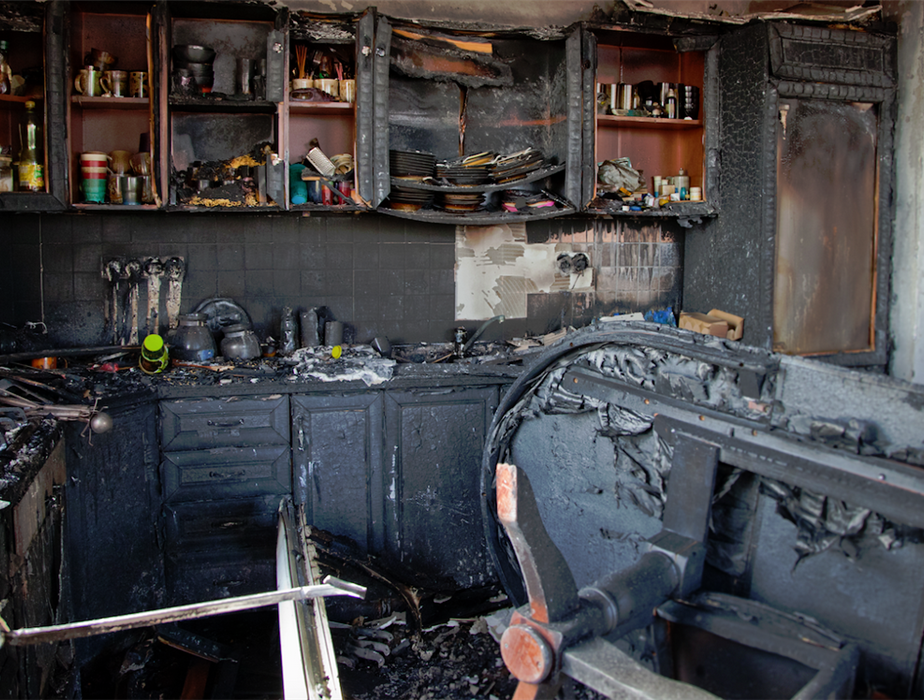 fire damaged kitchen with debris everywhere