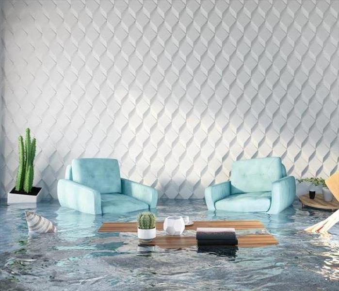 flooded house with two blue armchairs and coffee table