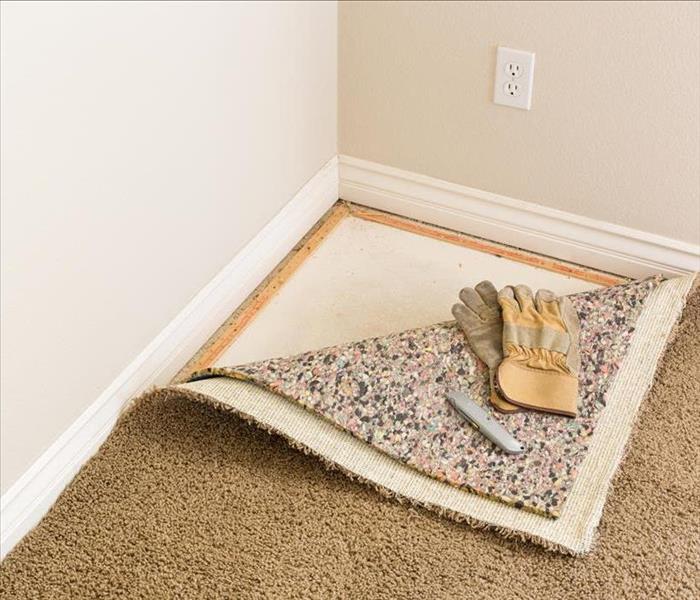 Carpeting pulled back